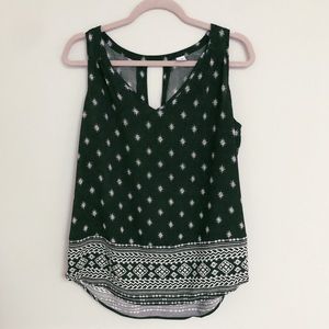 Black and white sleeveless blouse